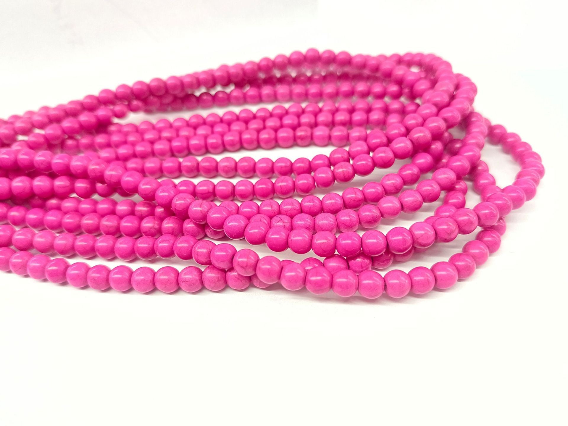 Al por mayor 10Strings/Pack Synthetic Turquesa Diy Round Beads